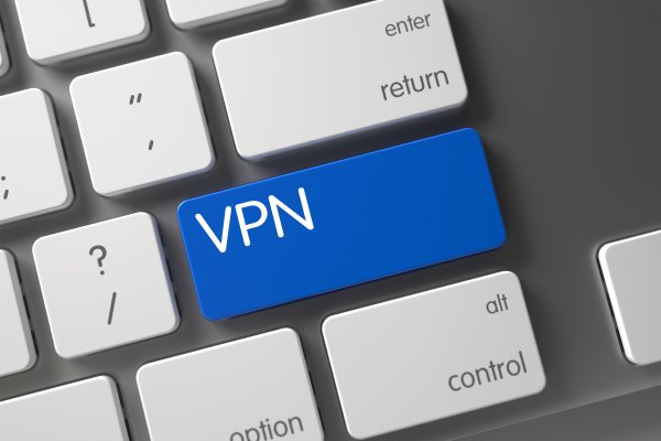 vpn nordvpn service free trial computer laptop keyboard blue VPN key